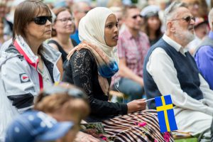 Norrkoping, Sweden - June 6, 2014: Immigrants and native Swedes participating in National day celebrations in Norrkoping. The national day of Sweden is an official holiday.