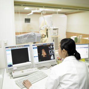 medicinea doctor and a patient looking at MRI pictures